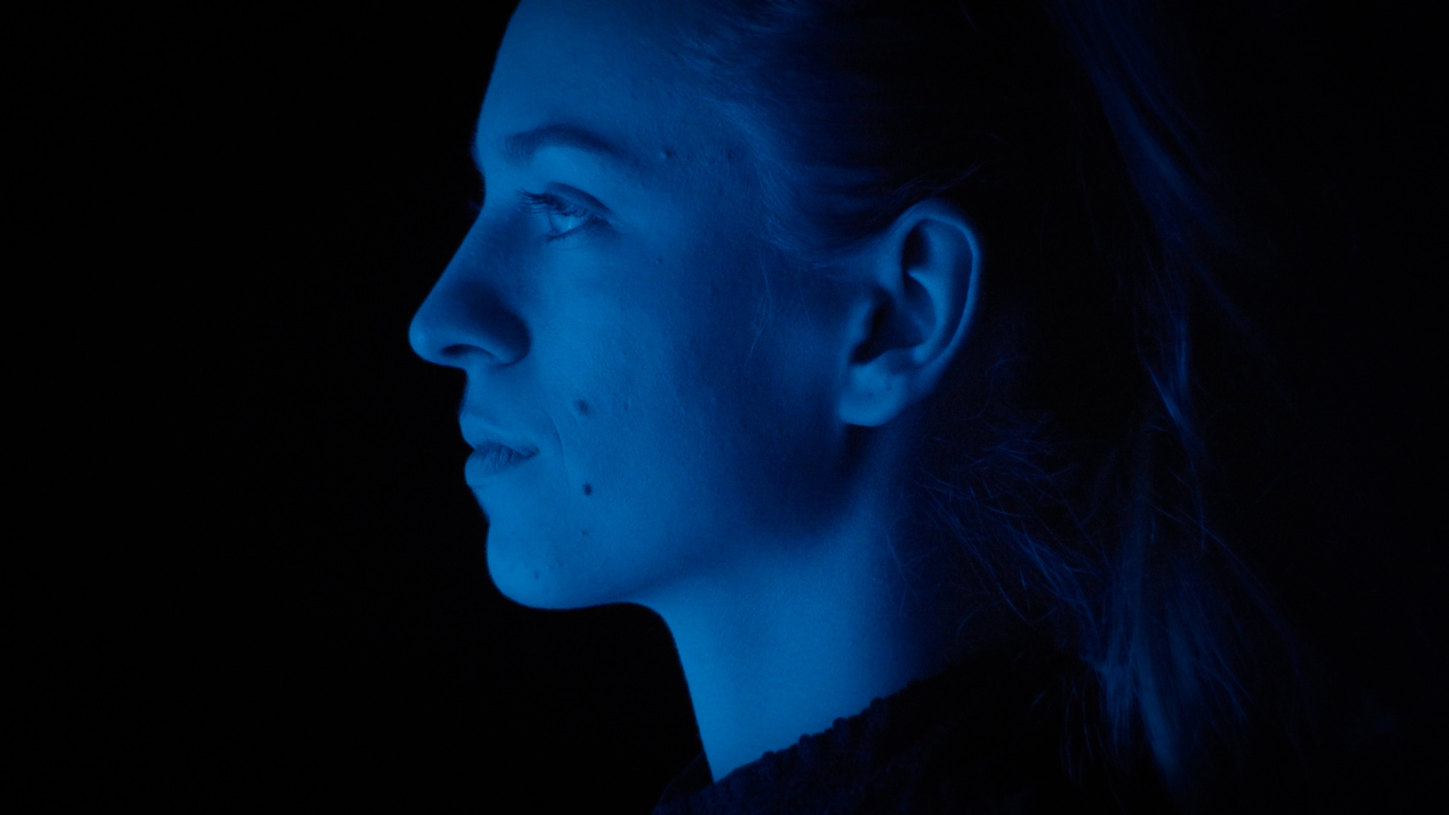 artifical picture from a girl in blue light